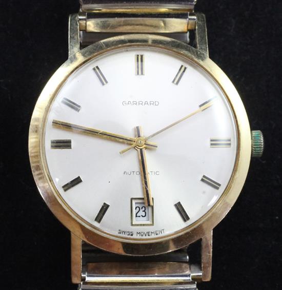 A gentlemans late 1970s 9ct gold Garrard automatic wrist watch,